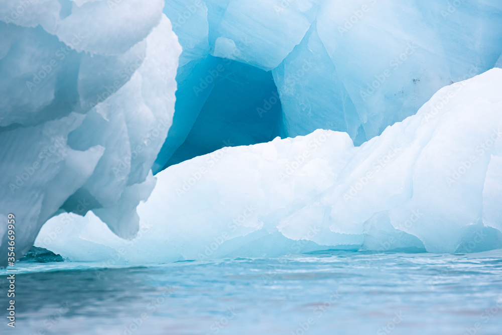 A blue Ice berg in the Arctic near Svalbard