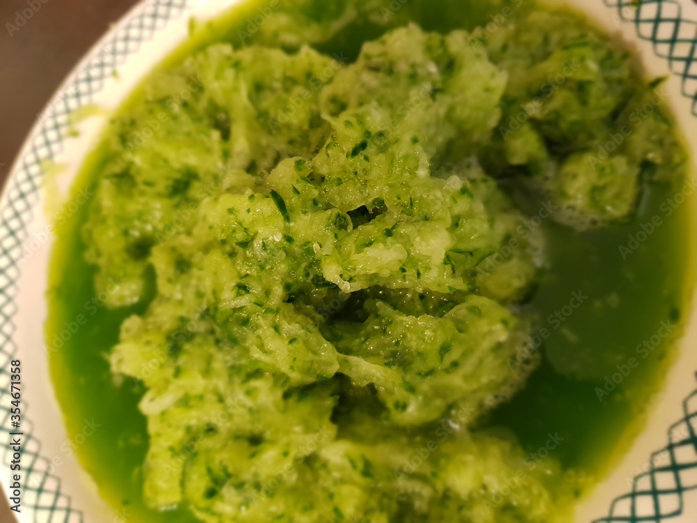 mashed cucumber in a bowl for making tzatsiki mashed cucumber in a bowl for making tzatsiki