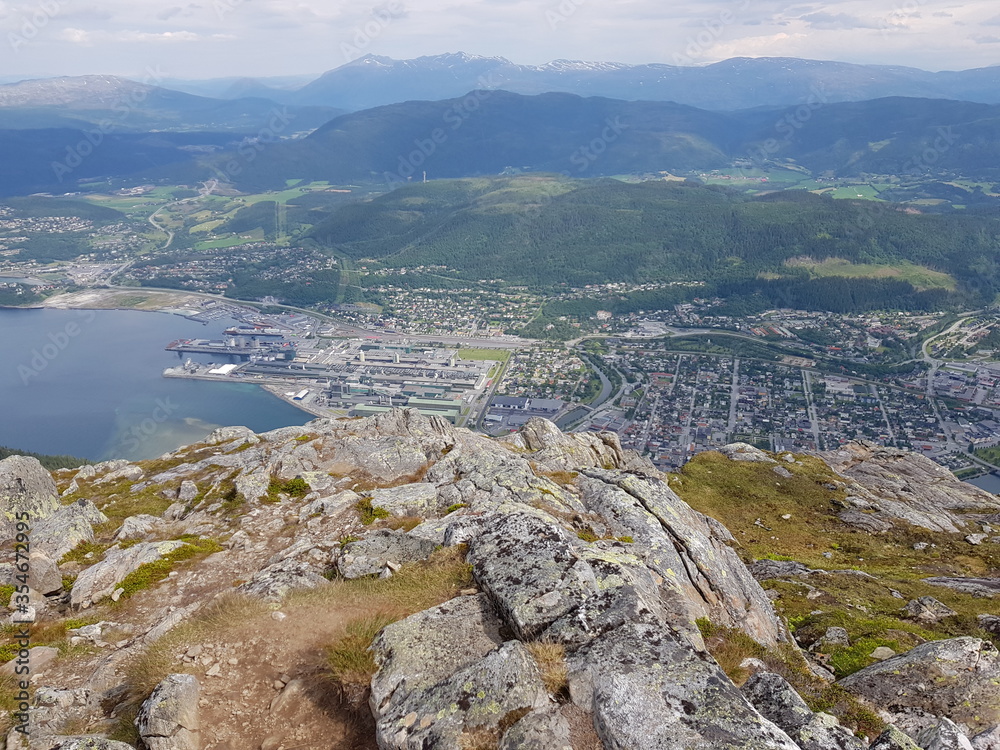 overview photo of the city of Mosjoen in northern Norway as seen from the top of the oyfjellet mountain in summer