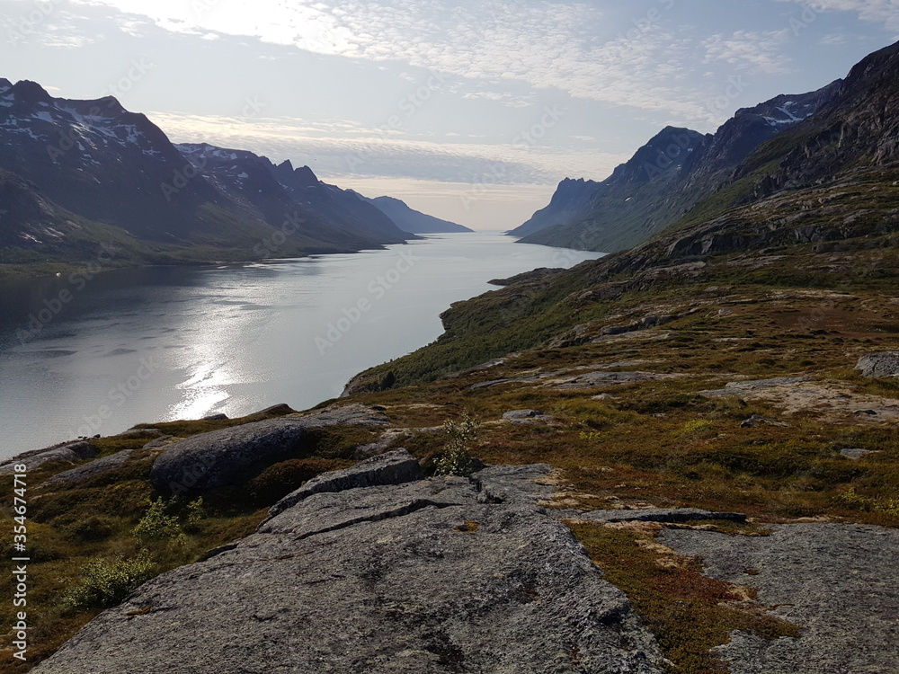 sunset in the mountain fjord valley in northern Norway sunset in the mountain fjord valley in northern Norway