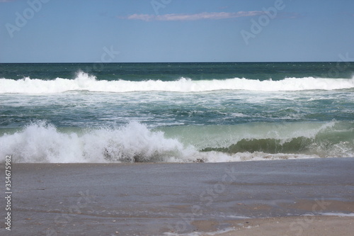 Waves splashing up on the beach