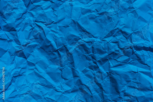  Sheet of blue crumpled paper useful as a background.