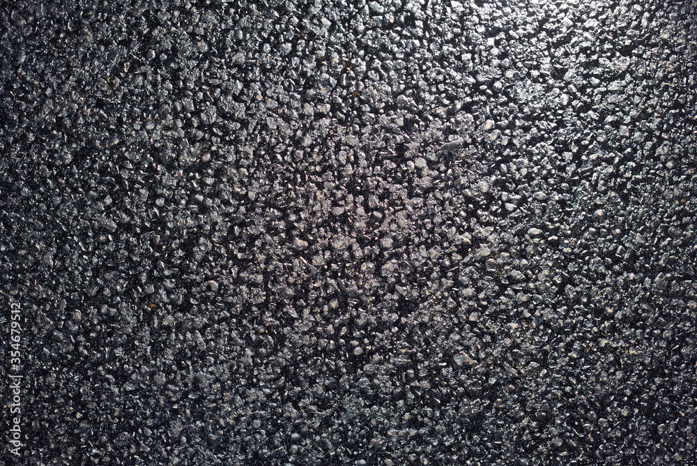 Texture of fresh and new black asphalt. Background of new asphalt Texture of fresh and new black asphalt. Background of new asphalt