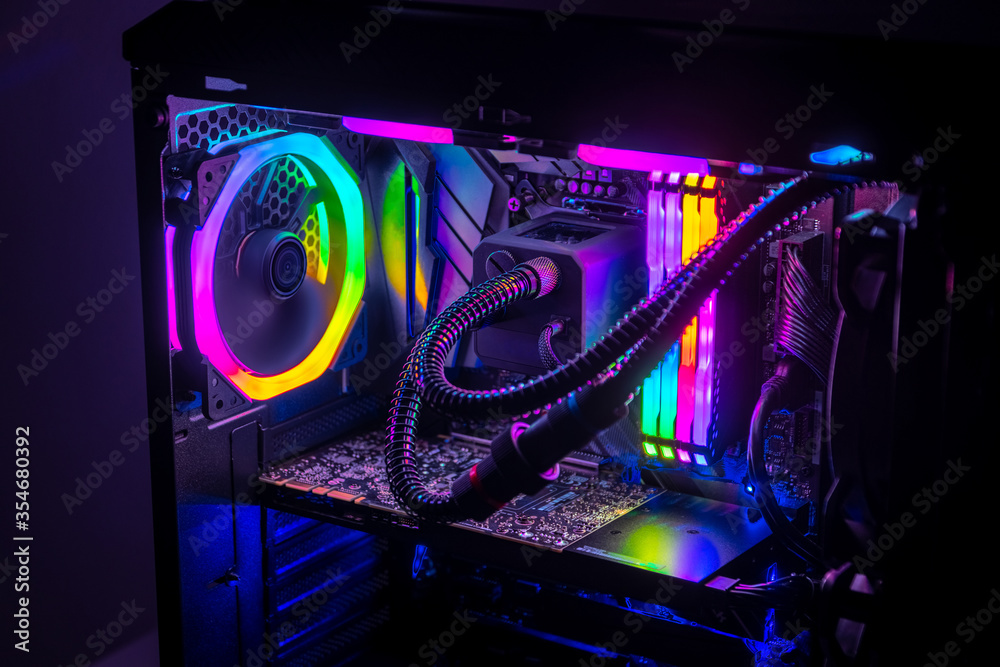 Gaming PC with RGB LED lights on a computer, assembled with hardware  components Photos | Adobe Stock