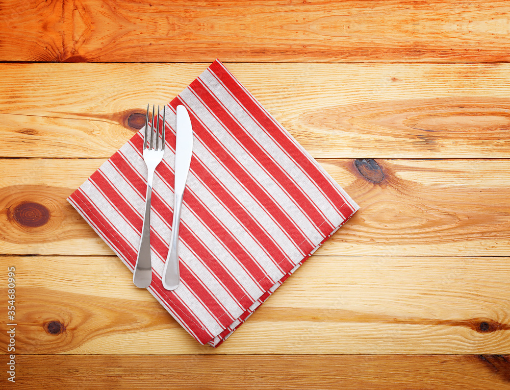 Empty wooden deck table with table cloth Empty wooden deck table with table cloth