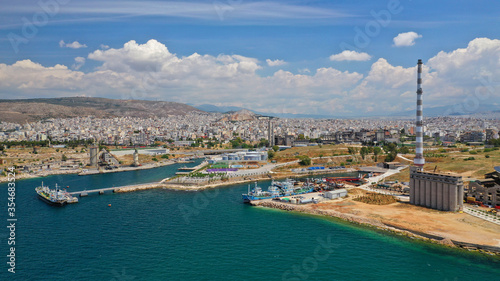 Φωτογραφία Aerial drone photo of old abandoned fertiliser factory in Piraeus port where tom