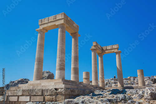 The ruins of the stoa psithyros at the Lindos acropolis on the Greek island of Rhodes