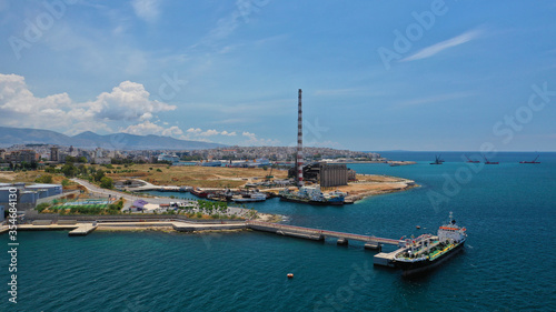 Φωτογραφία Aerial drone photo of old abandoned fertiliser factory in Piraeus port where tom