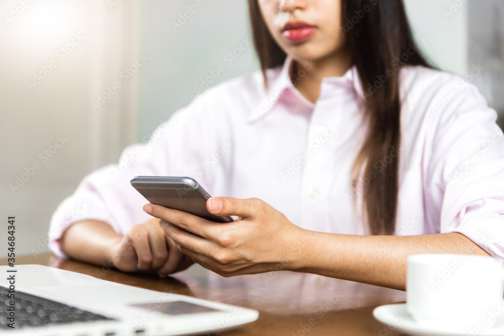 Close up on serious Asian businesswoman working Close up on serious Asian businesswoman working