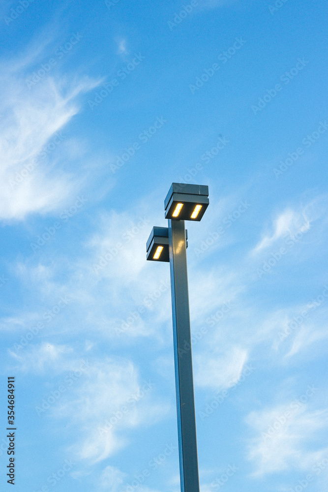 Modern lantern post against the blue sky
Modern lantern post against the blue sky