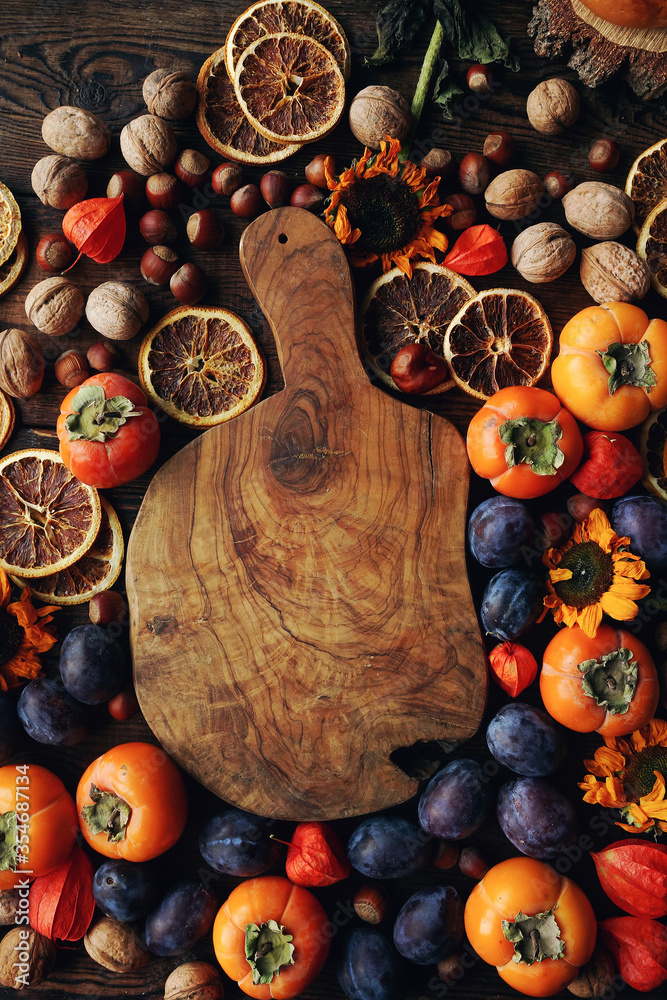Autumn still-life composition with fresh fruits and vegetables on rustic wooden table Autumn still-life composition with fresh fruits and vegetables on rustic wooden table