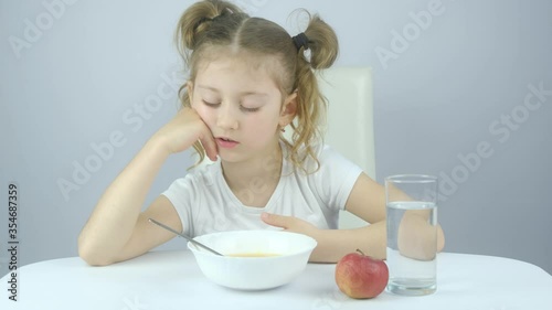 Wallpaper Mural school little girl falls asleep at Breakfast, did not go to bed for a long time Torontodigital.ca