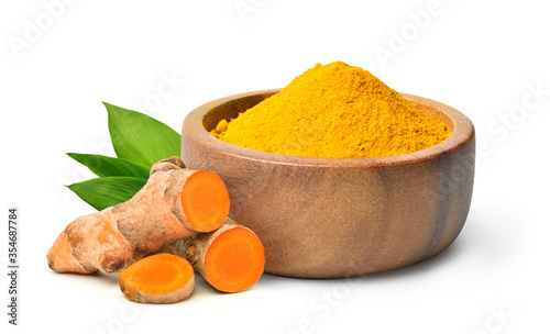 Fototapeta Naklejka Na Ścianę i Meble -  Finely dry Turmeric (Curcuma longa Linn) powder in wooden bow with  rhizome (root) sliced isolated on white background.