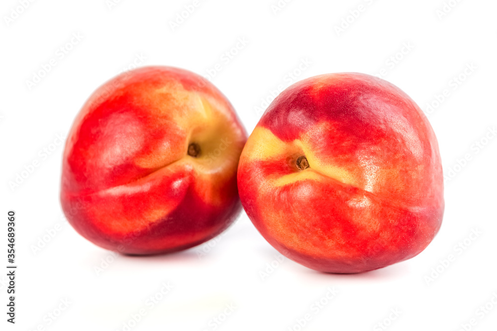 Fresh organic peaches isolated on white background Fresh organic peaches isolated on white background