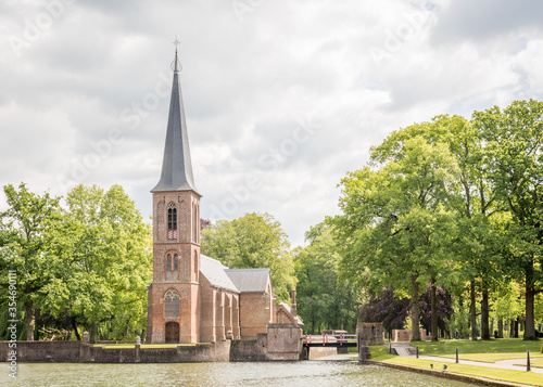 Dutch medieval church, surrounded by water
