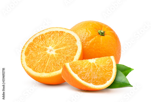 Natural orange fruit with cut in half and green leaves isolated on white background.