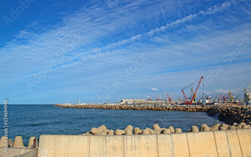 Industrial background with construction cranes in seaport in Casablanca, Morocco photo