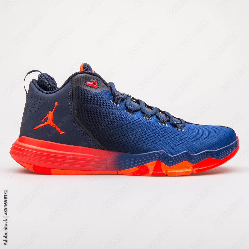 VIENNA, AUSTRIA - JUNE 14, 2017: Nike Jordan CP3 IX AE infrared and blue  sneaker isolated on grey background Stock Photo | Adobe Stock