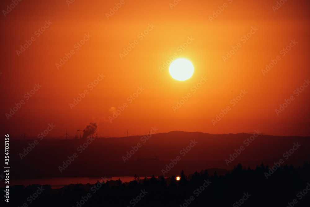 Big sun on the mountain in the morning. Scotland Big sun on the mountain in the morning. Scotland