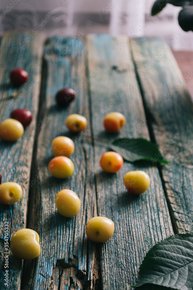 Fresh homemade ripe cherries on a wooden old background. Summer still life Fresh homemade ripe cherries on a wooden old background. Summer still life