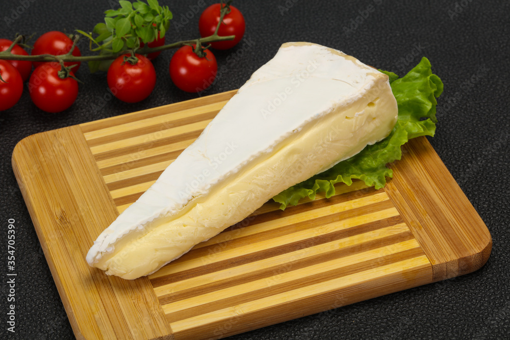 Brie cheese triangle served salad