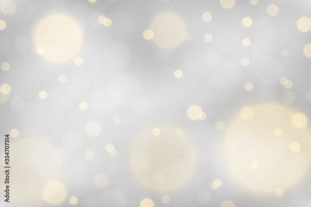 Fototapeta Silver bokeh background. Christmas glowing silver and golden lights with sparkles. Holiday decorative effect.