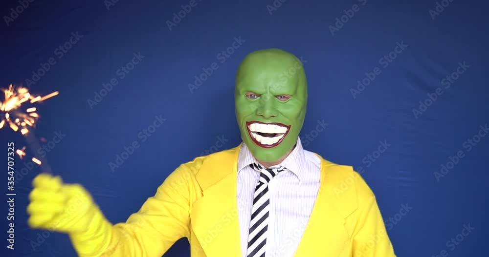Senior burner sparkler worker takes off a mask blossoms with a charismatic appearance with daylight bright blue eyes shooting front clothing yellow Senior burner sparkler worker takes off a mask blossoms with a charismatic appearance with daylight bright blue eyes shooting front clothing yellow