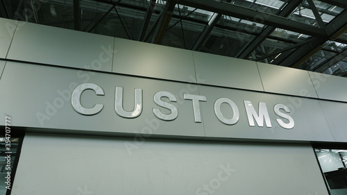 Airport customs declare sign on the wall at international terminal. Customs declare for import and export concept