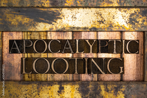 Tablou pe pânză Photo of real authentic typeset letters forming Apocalyptic Looting of text on v