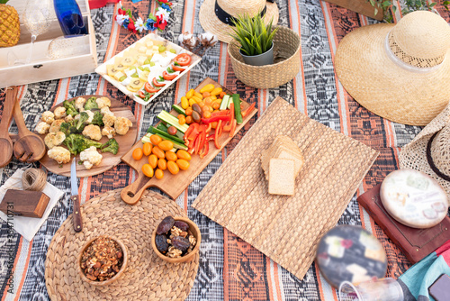 фотографія Beautiful summer picnic on the beach at sunset in zero waste style