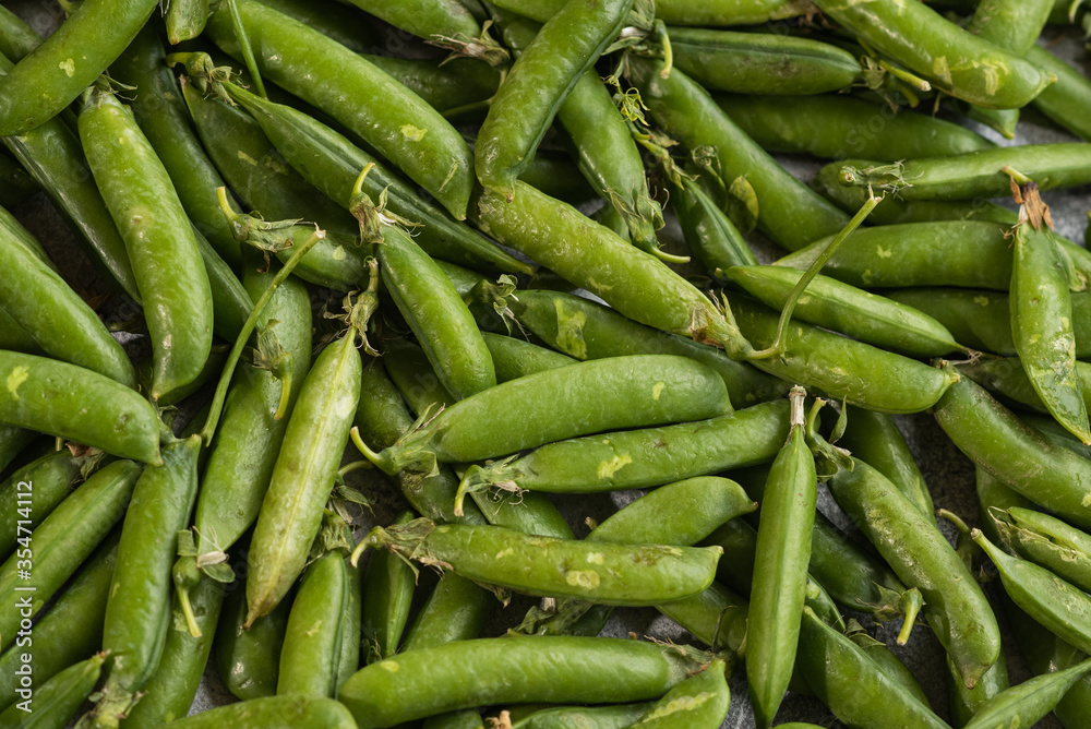 A lot of fresh and tasty green peas. Healthy food A lot of fresh and tasty green peas. Healthy food