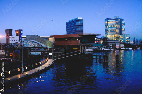 Photography View of Oosterdok district at dusk, Amsterdam contemporary architecture along th
