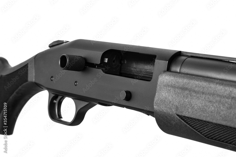 Modern black shotgun isolated on white background.  Weapons for hunting, sports and self-defense.