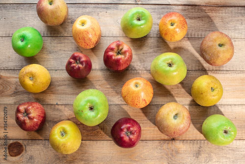 Tasty green, yellow and red apples. Healthy and nutritious food Tasty green, yellow and red apples. Healthy and nutritious food