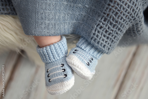 baby legs in handmade booties