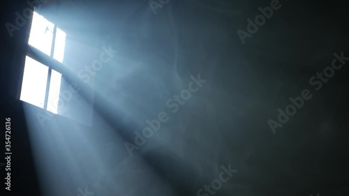 Smoke in a ray. Light falling from a window.