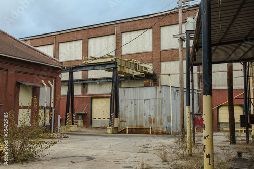 Large abandoned industrial warehouse left forgotten in rural Atlanta Georgia