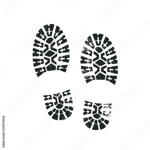 Bootprints isolated on white. Grunge effect. Vector illustration.