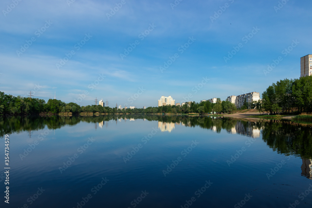 Landscape of a lake in the city with blue sky