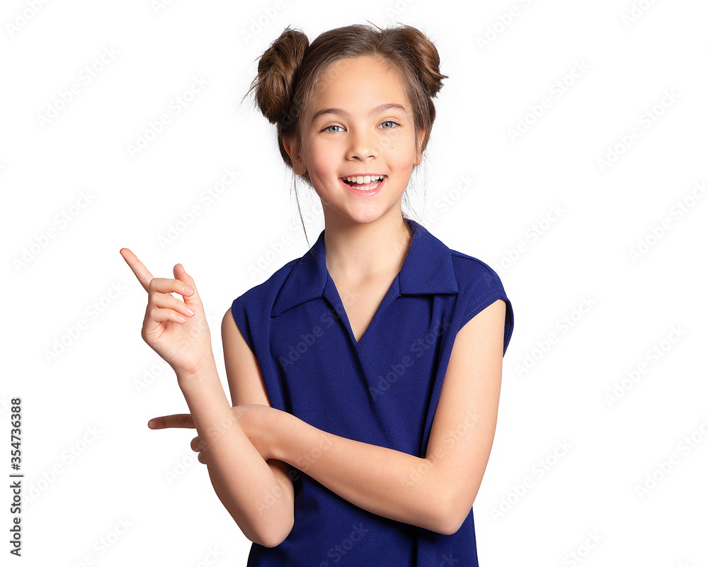 Funny girl. A beautiful European teen girl in a blue dress on a white background smiles and gestures. Face for advertising. Young skin without makeup. Funny girl. A beautiful European teen girl in a blue dress on a white background smiles and gestures. Face for advertising. Young skin without makeup.