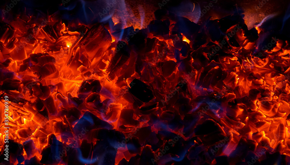 Burning coal, soft focus. Textures, background, abstract Burning coal, soft focus. Textures, background, abstract