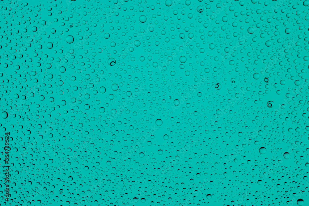 Drops water on glass. Wet rain pattern texture background.