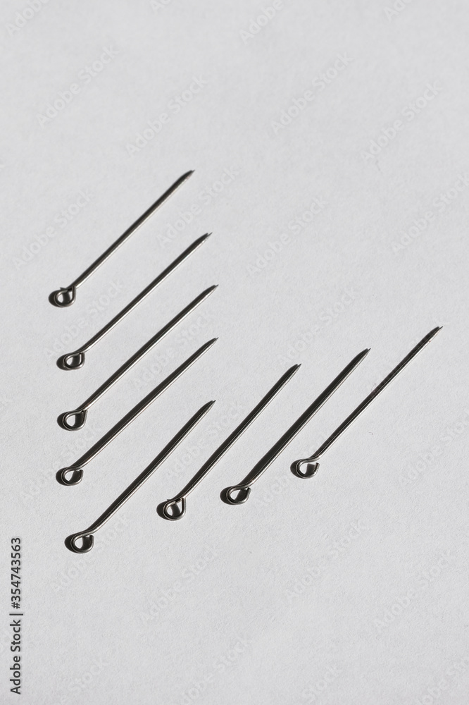 close up of a tailor pins close up of a tailor pins