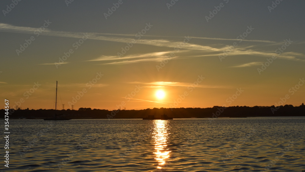 Naklejka premium Sunset over Poole Harbour
