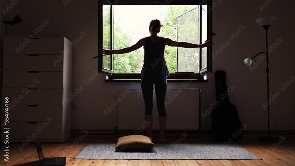 woman doing yoga at home woman doing yoga at home