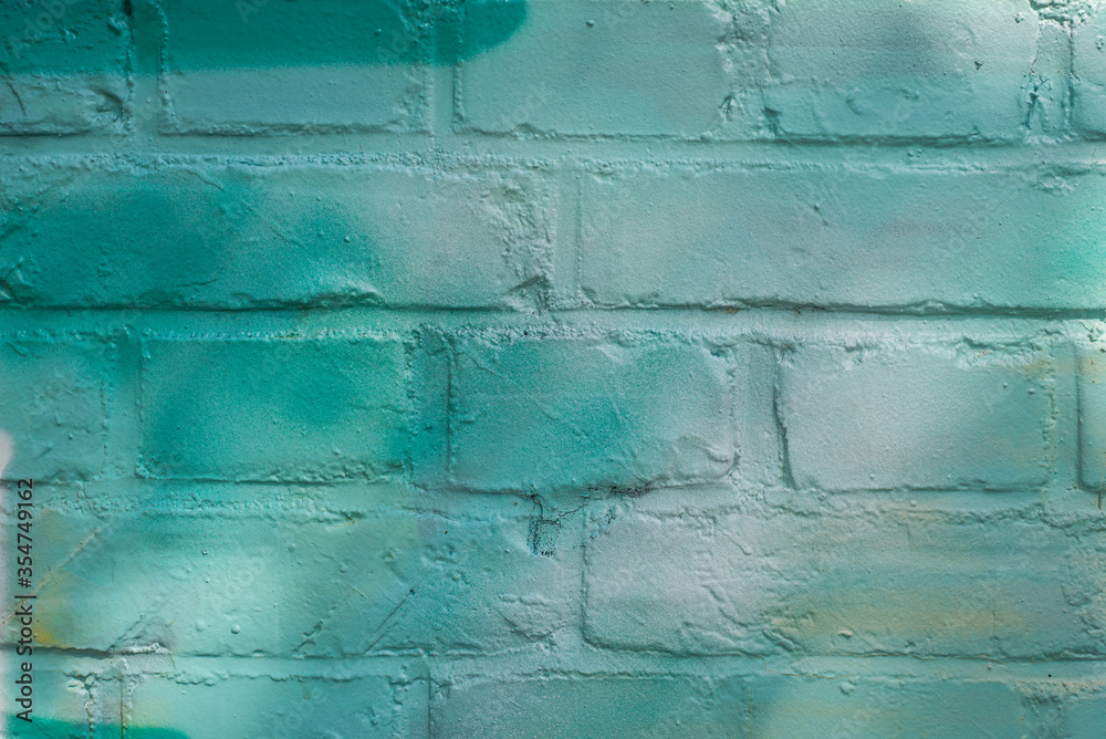 closeup of brick wall painted in green closeup of brick wall painted in green
