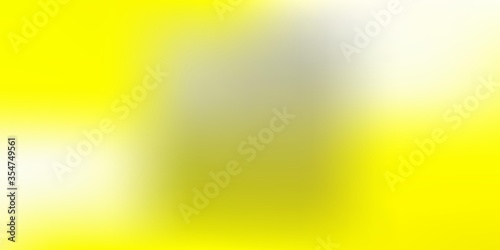 Light Yellow vector abstract blur texture.