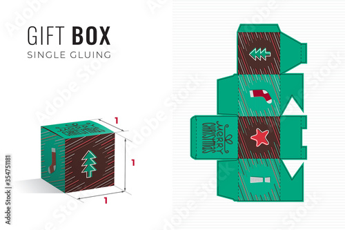 Merry Christmas Gift Box Die Cut Cube Template with 3D Preview - Black Blueprint Layout with Cutting and Scoring Lines over Brown Calligraphic Lettering on Green - Packaging Graphic Design