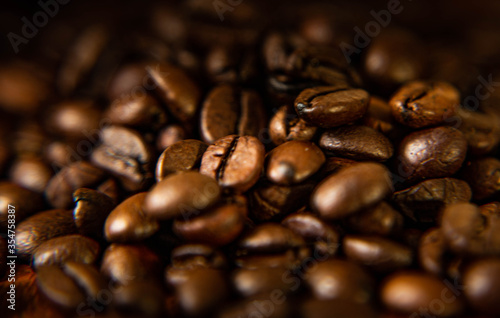 coffee beans on a black background © Jony