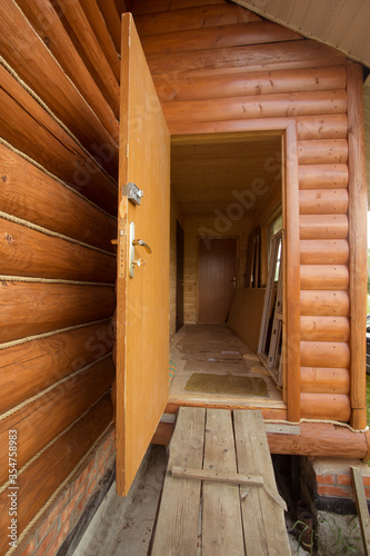  wooden log hut door of the cottage village